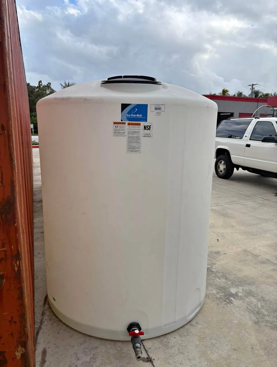 Representative used 1000-gallon bulk liquid storage tank